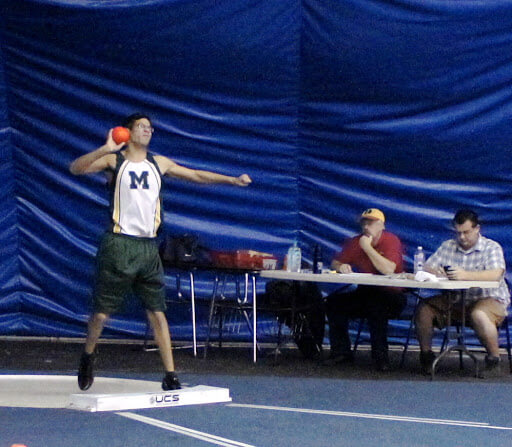 Me throwing a shot put with no wrist wrap.